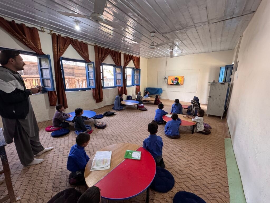 Technology-assisted learning inside a Chitral classroom.